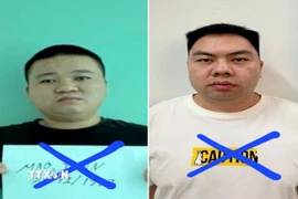 Đối tượng Mao Jibin (trái) và Gao Zhao (phải). (Ảnh: TTXVN phát)