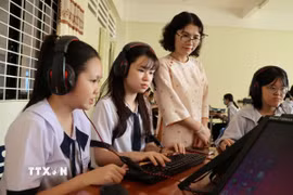 Thông tư 57 làm rõ mối quan hệ giữa bảo đảm chất lượng và công nhận đạt chuẩn quốc gia. (Ảnh minh họa: TTXVN phát)