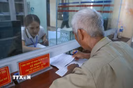 Bảo đảm bộ máy nhà nước đi vào hoạt động thông suốt, không bị gián đoạn sau khi thực hiện sắp xếp. (Ảnh: Công Luật/TTXVN)