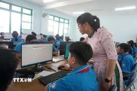 Hà Nội đặt mục tiêu 50% trường phổ thông ứng dụng AI vào năm 2030. (Ảnh minh họa: Thu Hoài/TTXVN)