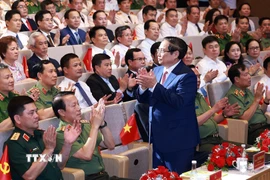Thủ tướng Phạm Minh Chính dự Đại hội Thi đua “Vì an ninh Tổ quốc” lần thứ 9. (Ảnh: Dương Giang/TTXVN)