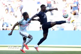 Folarin Balogun ra sân trong trận Mỹ thua Bỉ 1-4. (Ảnh: AFP/TTXVN)