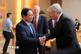 Thủ tướng Phạm Minh Chính làm việc với Đoàn Hội đồng kinh doanh Hoa Kỳ-ASEAN. (Ảnh: Dương Giang/TTXVN)