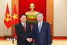 Tổng Bí thư Tô Lâm tiếp đồng chí Thượng tướng Vanthong Kongmany, Bí thư Trung ương Đảng, Bộ trưởng Bộ Công an Lào. (Ảnh: Thống Nhất/TTXVN)