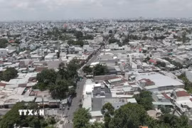 Sau sáp nhập, xã Bà Điểm có diện tích tự nhiên 27,36km2 và quy mô dân số đặc biệt lớn, lên tới hơn 206.000 người. (Ảnh: Hữu Duyên/TTXVN)