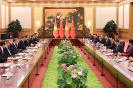 Chủ tịch nước Lương Cường hội đàm với Tổng Bí thư, Chủ tịch nước Trung Quốc Tập Cận Bình. (Ảnh: Lâm Khánh/TTXVN)