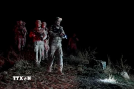 Lực lượng cứu hộ và binh sỹ Thổ Nhĩ Kỳ tìm kiếm máy bay quân sự Libya gặp nạn tại huyện Haymana. (Ảnh: AA/TTXVN)