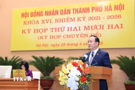 Ông Nguyễn Ngọc Tuấn, Phó Bí thư Thành ủy, Chủ tịch HĐND phát biểu tại kỳ họp. (Ảnh: Quốc Lũy/TTXVN)