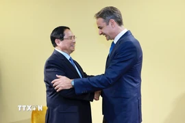 Thủ tướng Phạm Minh Chính gặp Thủ tướng Hy Lạp Kyriakos Mitsotakis. (Ảnh: Dương Giang/TTXVN)