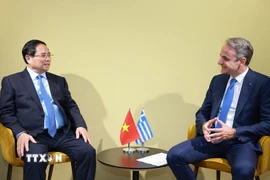 Thủ tướng Phạm Minh Chính gặp Thủ tướng Hy Lạp Kyriakos Mitsotakis. (Ảnh: Dương Giang/TTXVN)