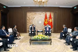 Tổng Bí thư, Chủ tịch nước Tô Lâm tiếp đồng chí Athsaphangthong Siphandone, Ủy viên Trung ương Đảng, Bí thư Thành ủy, Chủ tịch Hội đồng Nhân dân thủ đô Vientiane, Lào. (Ảnh: Thống Nhất/TTXVN)