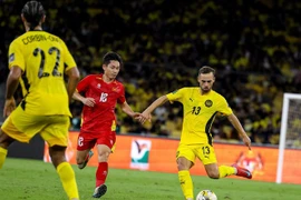 Hình ảnh trận Tuyển Việt Nam thua trước Malaysia ở vòng loại Asian Cup. (Ảnh: Malaysia NT)