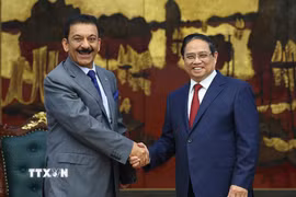 Thủ tướng Phạm Minh Chính tiếp ông Yousef Ashour Al-Sabbagh, Đại sứ Kuwait tại Việt Nam. (Ảnh: Dương Giang/TTXVN)