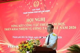 Ông Đoàn Minh Dũng, Trưởng Thuế Thành phố Hồ Chí Minh, phát biểu tại hội nghị. (Ảnh: Hứa Chung/TTXVN)