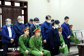 Các bị cáo trong phiên tòa ngày 15/12/2025. (Ảnh: Tuấn Anh/TTXVN)