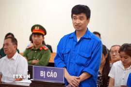 Hội đồng xét xử tuyên phạt bị cáo Phan Quốc Việt 7 năm tù, tổng hợp với hình phạt 30 năm tù của Tòa án Quân sự Trung ương, buộc bị cáo chấp hành hình phạt chung của nhiều bản án là 30 năm tù. (Ảnh: TTXVN phát)