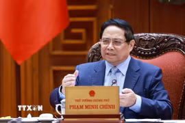 Thủ tướng Phạm Minh Chính chủ trì cuộc họp về triển khai đẩy nhanh tiến độ thực hiện các dự án đường sắt kết nối Việt-Trung. (Ảnh: Dương Giang/TTXVN)