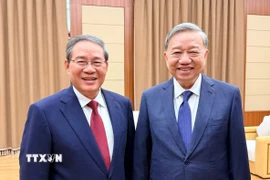 Tổng Bí thư Tô Lâm gặp Thủ tướng Trung Quốc Lý Cường. (Ảnh: TTXVN)