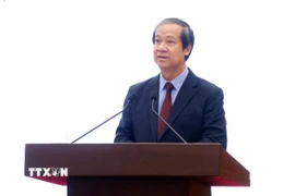 Ông Nguyễn Kim Sơn, Ủy viên Trung ương Đảng, Bộ trưởng Bộ Giáo dục và Đào tạo trả lời câu hỏi của phóng viên các cơ quan thông tấn, báo chí. (Ảnh: Phạm Kiên/TTXVN)