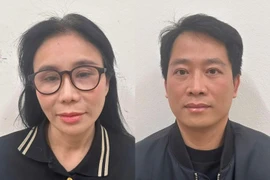 Phan Thị Mai và chồng Hoàng Kim Khánh tại cơ quan điều tra. (Nguồn: Bộ Công an)