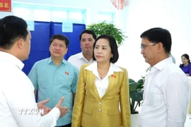 Phó Chủ tịch Quốc hội Nguyễn Thị Thanh đã đến kiểm tra, giám sát công tác tổ chức bầu cử tại xã Tân Nhựt, Thành phố Hồ Chí Minh. (Ảnh: Hữu Duyên/TTXVN)