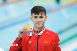 Phạm Thanh Bảo giành HCV nội dung 100m ếch nam. (Ảnh: Minh Quyết/TTXVN)