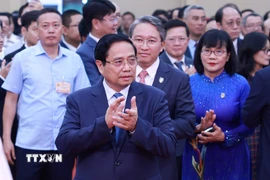 Thủ tướng Phạm Minh Chính đến dự Lễ kỷ niệm 80 năm Ngày truyền thống ngành Tư pháp. (Ảnh: Dương Giang/TTXVN)