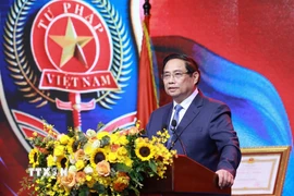 Thủ tướng Phạm Minh Chính phát biểu tại Lễ kỷ niệm 80 năm Ngày truyền thống ngành Tư pháp. (Ảnh: Dương Giang/TTXVN)