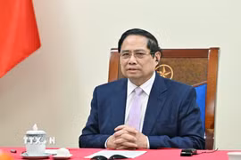 Thủ tướng Phạm Minh Chính điện đàm với Thủ tướng Malaysia Anwar Ibrahim. (Ảnh: Dương Giang/TTXVN)