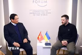 Thủ tướng Phạm Minh Chính gặp Tổng thống Ukraine Volodymyr Zelensky. (Ảnh: Dương Giang/TTXVN)