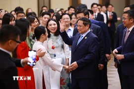 Thủ tướng Phạm Minh Chính gặp cộng đồng, lưu học sinh Việt Nam tại khu vực Bắc Kinh, Thiên Tân, Hà Bắc (Trung Quốc). (Ảnh: Dương Giang/TTXVN)