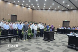 Các bị cáo tại phiên tòa hôm 24/6. (Ảnh: Kim Anh/TTXVN)