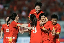 Tuyển nữ Việt Nam quyết chiến thắng để giành vé chung kết. (Ảnh: Minh Quyết/TTXVN)