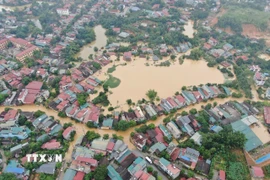 Phường Nam Cường, tỉnh Lào Cai có hàng trăm hộ dân bị ngập sâu do mưa lũ sau bão số 10. (Ảnh: Tuấn Anh/TTXVN)