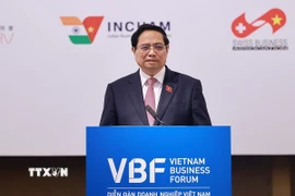 Thủ tướng Phạm Minh Chính phát biểu tại Diễn đàn doanh nghiệp Việt Nam thường niên với chủ đề “Doanh nghiệp đồng hành với Chính phủ chuyển đổi xanh trong kỷ nguyên số.” (Ảnh: Dương Giang/TTXVN)
