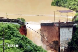 Hiện trường đập thủy điện Bắc Khê (Lạng Sơn) bị vỡ chiều 7/10/2025. (Ảnh: TTXVN phát)