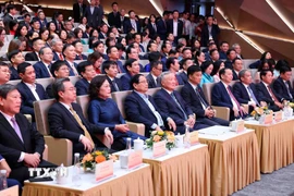 Thủ tướng Phạm Minh Chính và các đại biểu tham dự Đại hội thi đua yêu nước ngành Ngân hàng lần thứ 9. (Ảnh: Phạm Kiên/TTXVN)