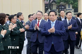 Thủ tướng Phạm Minh Chính đến dự Hội nghị toàn quốc tổng kết công tác Tư pháp năm 2025. (Ảnh: Dương Giang/TTXVN)