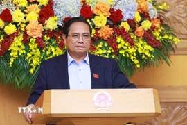 Thủ tướng Phạm Minh Chính chủ trì cuộc họp với Hội đồng Tư vấn chính sách về phát triển kinh tế tư nhân. (Ảnh: Dương Giang/TTXVN)
