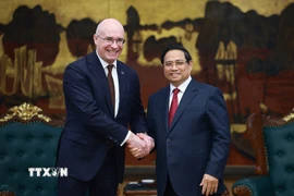 Thủ tướng Phạm Minh Chính tiếp Tổng giám đốc Hãng Thông tấn TASS (Liên bang Nga) Andrey Kondrashov. (Ảnh: Dương Giang/TTXVN)