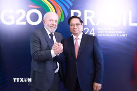 Thủ tướng Phạm Minh Chính và Tổng thống Brazil Luiz Inácio Lula da Silva. (Ảnh: Dương Giang/TTXVN)
