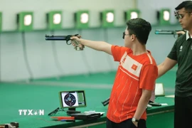 Bắn súng góp công giúp Việt Nam vượt mốc 80 HCV. (Ảnh: Minh Quyết/TTXVN)