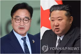 Chủ tịch Quốc hội Hàn Quốc Woo Won Shik và nhà lãnh đạo Triều Tiên Kim Jong Un. (Nguồn: Yonhap)