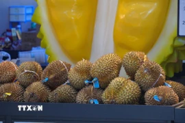 Sầu riêng được bày bán tại chợ Tân Phát Địa. (Ảnh: Quang Hưng/TTXVN)