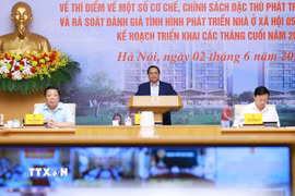 Thủ tướng Phạm Minh Chính chủ trì Hội nghị triển khai Nghị quyết của Quốc hội về thí điểm một số cơ chế, chính sách đặc thù phát triển nhà ở xã hội. (Ảnh: Dương Giang/TTXVN)