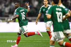 Niềm vui của các cầu thủ Mexico. (Ảnh: AFP/TTXVN)