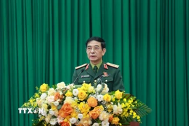 Đại tướng Phan Văn Giang, Ủy viên Bộ Chính trị, Phó Bí thư Quân ủy Trung ương, Bộ trưởng Bộ Quốc phòng, Đại biểu Quốc hội khóa XV tỉnh Thái Nguyên phát biểu tại Hội nghị. (Ảnh: Thu Hằng/TTXVN)