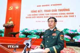Đại tướng Phan Văn Giang, Ủy viên Bộ Chính trị, Phó Bí thư Quân ủy Trung ương, Phó Thủ tướng Chính phủ, Bộ trưởng Bộ Quốc phòng phát biểu. (Ảnh: Hiền Hạnh/TTXVN)
