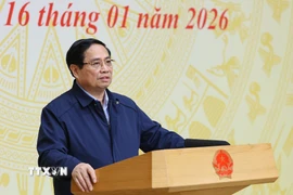 Thủ tướng Phạm Minh Chính phát biểu chỉ đạo Hội nghị tổng kết “Chiến dịch Quang Trung” xây dựng lại nhà cho các gia đình bị thiệt hại do bão lũ tại miền Trung. (Ảnh: Dương Giang/TTXVN)