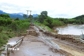 Một điểm ngập khá nặng trong đợt mưa lũ trên địa bàn xã Tương Dương. (Ảnh: Xuân Tiến/TTXVN)